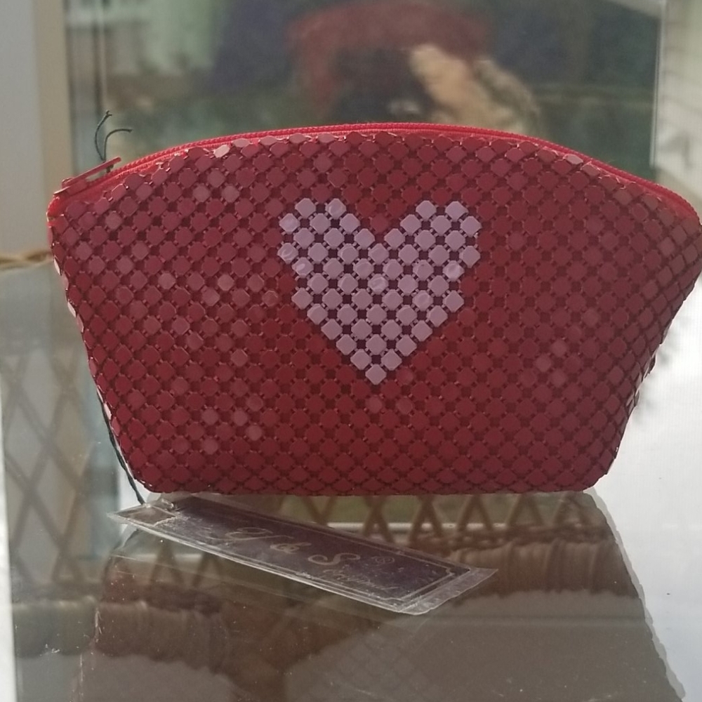Red zippered coin purse with pink heart